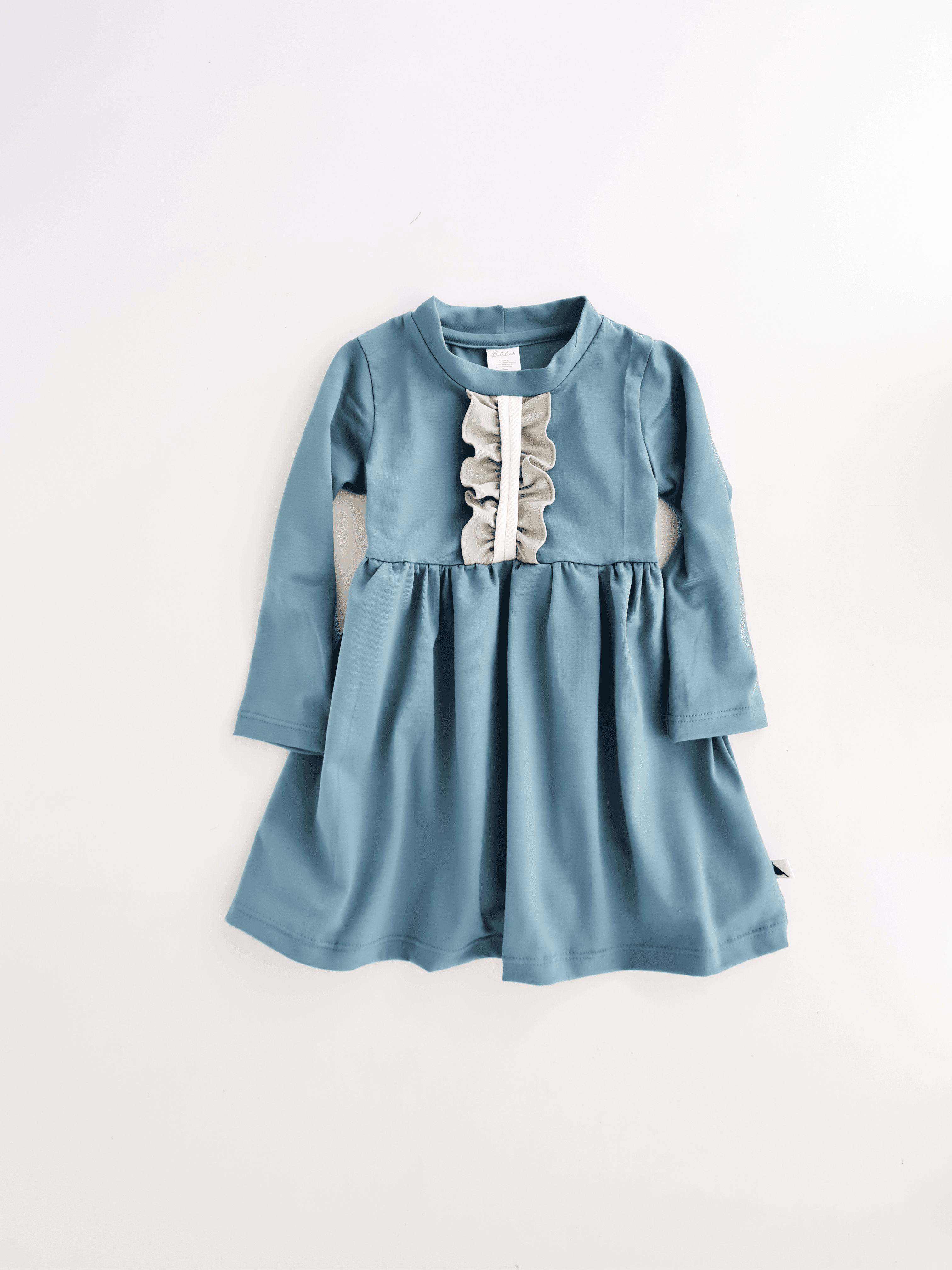 Petrol blue dress with a ruffle